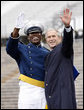 President George W. Bush celebrates with an unidentified graduate Wednesday, May 28, 2008, during commencement exercises at the United States Air Force Academy in Colorado Springs. White House photo by Eric Draper