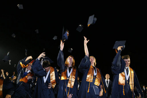 Graduates of Enterprise High School's Class of 2008 toss their caps into the air Thursday, May 29, 2008, during commencent exercises at the Alabama high school. Mrs. Laura Bush was on hand to deliver the commencement address to the class that lost four of its members in the 2007 tornadoes that devastated the city. White House photo by Shealah Craighead
