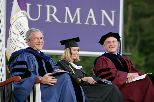 President George W. Bush shares a laugh with Furman University Student Commencement Speaker Meredith Neville and the Chairman of Furman University Board of Trustees Carl Kohrt during commencement ceremonies for the Class of 2008 at Furman University in Greenville, SC. White House photo by Chris Greenberg