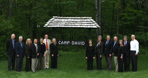 Mrs. Laura Bush poses with directors of the Presidential Libraries Wednesday, June 4, 2008, during their visit to Camp David in Thurmont, Maryland. White House photo by Shealah Craighead