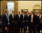 President George W. Bush gives the 2007 Major League Soccer Cup Champions, the Houston Dynamo, a tour of the Oval Office Thursday, June 5, 2008, during their visit to the White House. White House photo by Joyce N. Boghosian
