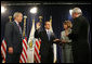 President George W. Bush looks on as White House Chief of Staff Joshua Bolten administers the oath of office to Secretary of Housing and Urban Development Steve Preston, Friday, June 6, 2008 in Washington, D.C. Holding the Bible for the ceremonial swearing-in is Molly Preston, wife of Secretary Preston. White House photo by Joyce N. Boghosian