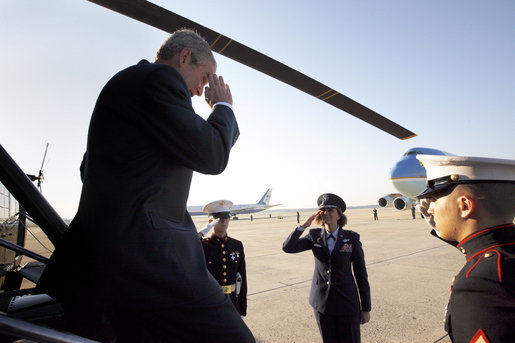 President George W. Bush gives a salute upon his arrival to Andrews Air Force Base Monday, June 9, 2008, before boarding Air Force One on a week-long trip to Europe. White House photo by Eric Draper