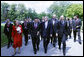 President George W. Bush, center, walks with a delegation of European Union leaders, Tuesday, June 10, 2008 at Brdo Castle in Kranj, Slovenia. From left are, Benita Ferrero-Waldner, commissioner for External Relations and European Neighborhood Policy; European Commission President Jose Manuel Barroso; Slovenia Prime Minister Janez Jansa; and Dimitrij Rupel, Slovenia Minister for Foreign Affairs, background right. White House photo by Eric Draper
