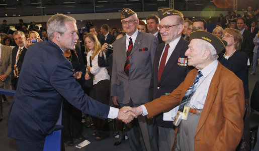 President George W. Bush meets with World War II veterans following his address to the Organization for Economic Co-operation and Development Friday, June 13, 2008, in Paris, honoring the strong relationship between the United States and Europe. White House photo by Eric Draper