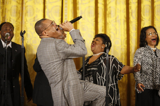Singer Walter Hawkins performs on stage in the East Room of the White House, where he was joined on stage by his brother, Edwin, Tuesday, June 17, 2008, in honor of Black Music Month. White House photo by Eric Draper