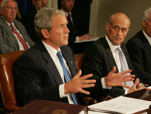 President George W. Bush talks to reporters about the government's response to the Midwest floods Tuesday morning, June 17, 2008. in the Roosevelt Room of the White House. Homeland Security Secretary Michael Chertoff, right, was one of the key leaders briefing the President. President Bush said he will travel to Iowa on Thursday to view the damage himself. White House photo by Joyce N. Boghosian