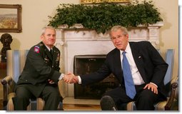 President George W. Bush thanks U.S. Army General Dan McNeill, former commander of the International Security Assistance Force, for his command service in Afghanistan following their meeting in the Oval Office Tuesday, June 17, 2008.  White House photo by Joyce N. Boghosian