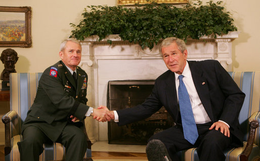 President George W. Bush thanks U.S. Army General Dan McNeill, former commander of the International Security Assistance Force, for his command service in Afghanistan following their meeting in the Oval Office Tuesday, June 17, 2008. White House photo by Joyce N. Boghosian