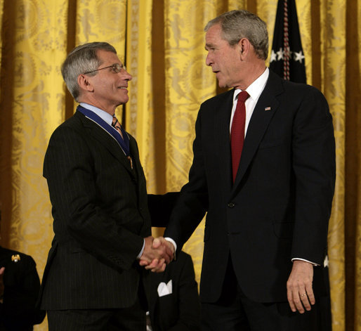 President George W. Bush shakes hands with Dr. Anthony Fauci Thursday, June 19, 2008, after presenting him with the 2008 Presidential Medal of Freedom during ceremonies in the East Room of the White House. White House photo by David Bohrer