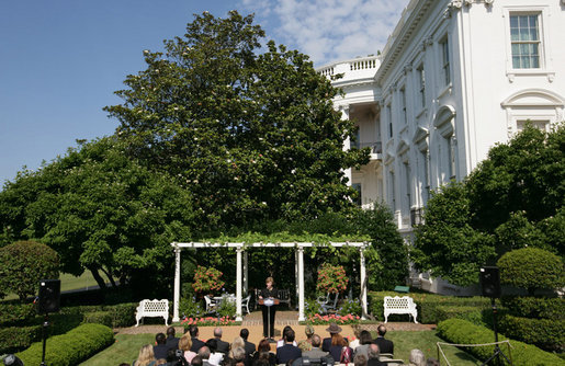 Mrs. Laura Bush delivers remarks in honor of World Refugee Day Friday, June 20, 2008, in the East Garden of the White House. In addressing her guests, Mrs. Bush announced the approval by President George W. Bush of a $32.8 million emergency funding to support unexpected and urgent needs, including food, for refugees and conflict victims in Africa, the Middle East, Asia and the Western Hemisphere. White House photo by Shealah Craighead