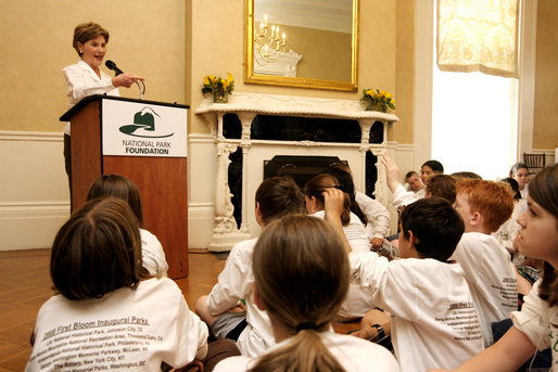 During remarks, Mrs. Bush calls on a student to name a type of plant they planted earlier in the day during National Park First Bloom event at the Charlestown Navy Yard in Boston, MA, Sunday, June 22, 2008. White House photo by Shealah Craighead