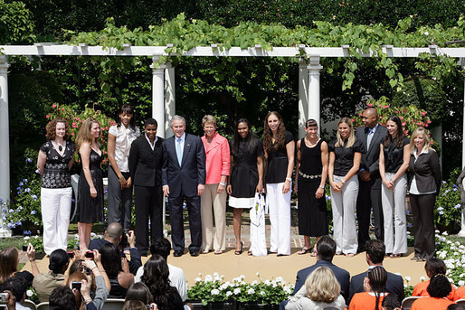 President George W. Bush poses for a photo with the 2007 WNBA Champions, the Phoenix Mercury, during their visit Monday, June 23, 2008, in the East Garden at the White House. White House photo by Chris Greenberg