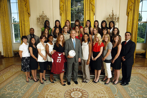 President George W. Bush stands with members of the University of Southern California Women's Soccer team, Tuesday, June 24, 2008, during a photo opportunity with the 2007 and 2008 NCAA Sports Champions. White House photo by Eric Draper
