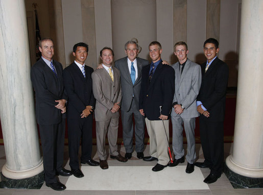 President George W. Bush stands with members of the UCLA Men's Golf team Tuesday, June 24, 2008, during a photo opportunity with the 2007 and 2008 NCAA Sports Champions. White House photo by Eric Draper