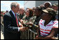President George W. Bush greets base personnel and their families at the Air National Guard Ramp of Jackson-Evers International Airport Tuesday July 1, 2008, in Jackson, MS. White House photo by Joyce N. Boghosian
