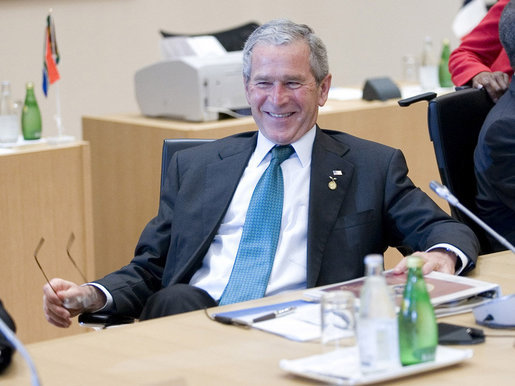 President George W. Bush relaxes prior to the start of the G8 Working Session with Africa Outreach Representatives Monday, July 7, 2008, at the Windsor Hotel Toya Resort and Spa in Toyako, Japan. White House photo by Eric Draper