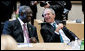 President George W. Bush shares a moment with President John Agyekum Kufuor of Ghana prior to the start Monday, July 7, 2008, of the G8 Working Session with Africa Outreach Representatives in Toyako, Japan. White House photo by Eric Draper