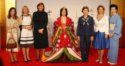 Spouses of G-8 leaders pose with a model dressed in a Junihitoe, a 12-layered ancient kimono, following a demonstration of traditional Japanese culture Monday, July 7, 2008, in Toyako, Japan. From left, the spouses are: Mrs. Margarida Uva Barroso, Mrs. Laureen Harper, Mrs. Sarah Brown, Mrs. Laura Bush, Mrs. Svetlana Medvedeva, and Mrs. Kiyoko Fukuda. White House photo by Shealah Craighead