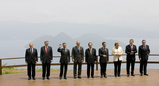With Lake Toya as a backdrop, leaders of the Group of Eight pose for the official family photograph Tuesday, July 8, 2008, in Toyako, Japan. White House photo by Eric Draper