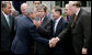 President George W. Bush shakes hands Thursday, July 10, 2008, with Senator Jay Rockefeller of West Virginia, after signing the FISA Amendments Act of 2008 in the Rose Garden at the White House. White House photo by Chris Greenberg