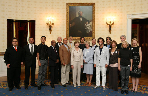 Mrs. Laura Bush poses with the winners of the 2008 Cooper-Hewitt National Design Awards at the White House on July 14, 2008. The awards are given in various disciplines such as communications, architecture, landscape, product, interior, fashion and people's design as well as in lifetime achievement, corporate achievement, special jury commendation. The awards are a tool to increase national awareness of design by promoting excellence, innovation and lasting achievement. The award program was first launched in 2000 at the White House as an official project of the White House Millennium Council. White House photo by Shealah Craighead
