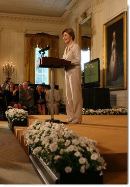 Mrs. Laura Bush welcomes attendees of the 2008 Cooper-Hewitt National Design Awards on July 14, 2008 in the White House East Room. The awards are given in various disciplines such as communications, architecture, landscape, product, interior, fashion and people's design as well as in lifetime achievement, corporate achievement, special jury commendation. They awards are a tool to increase national awareness of design by promoting excellence, innovation and lasting achievement. The award program was first launched in 2000 at the White House as an official project of the White House Millennium Council.  White House photo by Shealah Craighead