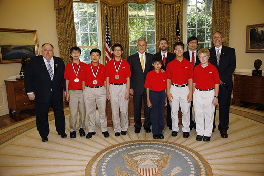 President George W. Bush welcomes the 2008 MATHCOUNTS National Competition Award winners to the Oval Office at the White House, Tuesday, July 15, 2008. From left are, math coach Jeffrey Boyd of Sugarland, Texas; Ding Zhou of Houston, Texas; Kevin Tian of Austin, Texas; Kevin Li of College Station, Texas; Darryl Wu of Bellevue, Wash.; coach Kristian Klaene of Lexington, Ky.; Anderson Wang of Ambler, Pa.; coach Lon-Chan Chu of Redmond, Wash.; Evan Miller of Owenboro, Ky., and coach David Hallas of Pittsburgh, Pa. White House photo by Eric Draper