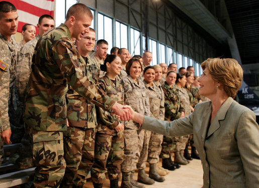 Mrs. Laura Bush shakes hands with military personnel Monday, Aug. 4, 2008, following remarks by President George W. Bush during their stop at Eielson Air Force Base, Alaska. White House photo by Shealah Craighead