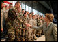Mrs. Laura Bush shakes hands with military personnel Monday, Aug. 4, 2008, following remarks by President George W. Bush during their stop at Eielson Air Force Base, Alaska. White House photo by Shealah Craighead