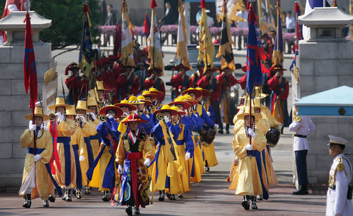 Ceremonial dancers arrive at the Blue House, the residence of President Myung-bak Lee of the Republic of Korea, for the arrival ceremonies Wednesday, Aug. 6, 2008, in Seoul for President George W. Bush and Mrs. Laura Bush. White House photo by Chris Greenberg