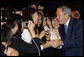 President George W. Bush greets United States Embassy personnel and family members Wednesday, Aug. 6, 2008, in Seoul. White House photo by Eric Draper