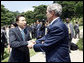 President George W. Bush shakes hands with South Korean President Lee Myung-bak before leaving the Blue House Wednesday, Aug. 6, 2008, in Seoul. White House photo by Eric Draper
