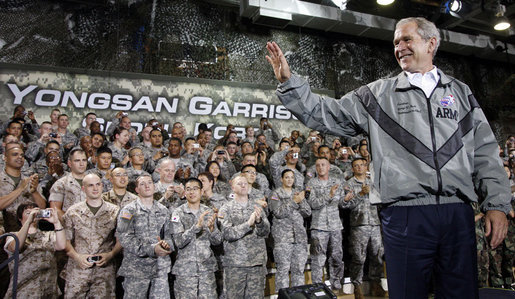 President George W. Bush waves as he is welcomed by U.S. military personnel before delivering his remarks Wednesday, Aug. 6, 2008, at the U.S. Army Garrison-Yongsan in Seoul. White House photo by Eric Draper