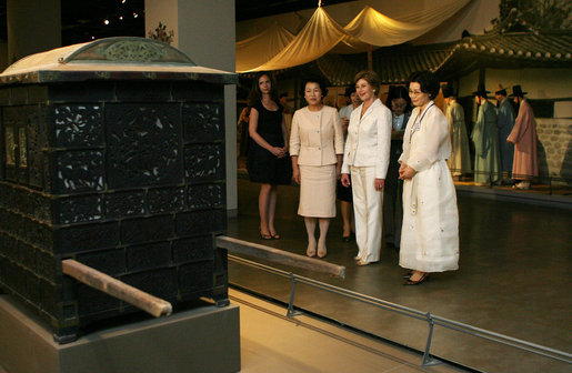 Mrs. Laura Bush, Barbara Bush and Mrs. Kim Yoon-ok, spouse of President Lee Myung-bak of the Republic of Korea, are led on a tour of the National Folk Museum of Korea Wednesday, Aug. 6, 2008, by Ms. Lee Ki Won, the museum's Deputy Director of Cultural Exchange and Education. White House photo by Shealah Craighead