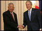 President George W. Bush is greeted by Prime Minister Samak Sundaravej of Thailand at a welcoming ceremony Wednesday, Aug. 6, 2008, in the Ivory Room of the Government House in Bangkok. White House photo by Chris Greenberg