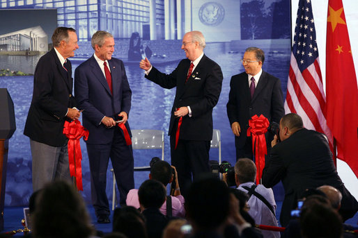 U.S. Ambassador to China Sandy Randt gives a thumbs-up to President George W. Bush and former President George H.W. Bush after they cut the ceremonial ribbon during a dedication Friday, Aug. 8, 2008, for the U.S. Embassy in Beijing. At right is Dai Bingguo, State Councilor, People’s Republic of China. White House photo by Shealah Craighead