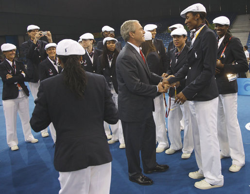 President George W. Bush meets with members of the women's U.S. Olympic Basketball Team Friday evening, Aug. 8, 2008 at the National Stadium in Beijing, prior to the U.S. Olympians marching in the Opening Ceremonies at the 2008 Summer Olympics. White House photo by Eric Draper