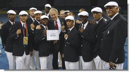President George W. Bush poses for photos with members of the United States Olympic Boxing Team Friday, Aug. 8, 2008, before the Opening Ceremony of the 2008 Summer Olympic Games in Beijing. White House photo by Eric Draper