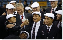 President George W. Bus shares a moment with members of the U.S. Olympic team Friday, Aug. 8, 2008, in Beijing prior to Opening Ceremony of the 2008 Summer Olympic Games. White House photo by Eric Draper