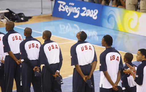 Members of the U.S. Men's Olympic Basketball Team line up on the court during pre-game ceremonies Sunday, Aug. 10, 2008, before playing China at the 2008 Summer Olympic Games in Beijing. White House photo by Eric Draper