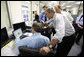 President George W. Bush is shown a computer tracking the latest position of Hurricane Gustav during a briefing Monday, Sept. 1, 2008 at the Texas Emergency Operations Center in Austin, Texas. White House photo by Eric Draper