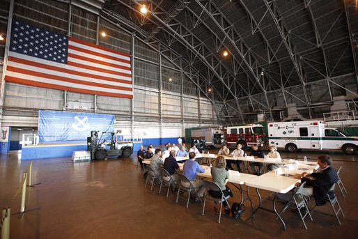 President George W. Bush attends a briefing inside an aircraft hanger Monday, Sept. 1, 2008, at Lackland Air Force Base in San Antonio, Texas, for the latest update on response preparation for Hurricane Gustav. White House photo by Eric Draper