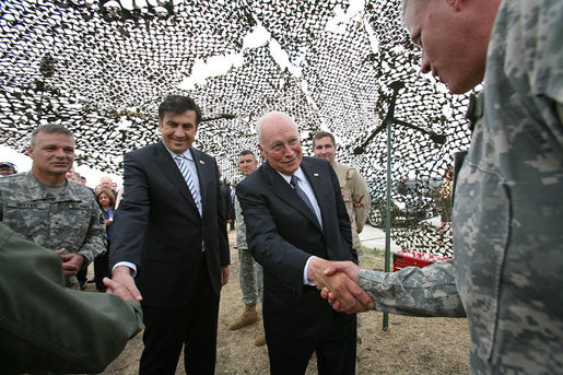 Vice President Dick Cheney and Georgian President Mikheil Saakashvili greet U.S. troops Thursday, Sept. 4, 2008 at a relief operation center in Tbilisi. To date, the U.S. has delivered over $30 million in aid, including 1200 tons of food and relief supplies to Georgians affected by the recent conflict with Russia. White House photo by David Bohrer