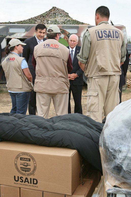 Vice President Dick Cheney and Georgian President Mikheil Saakashvili speak with USAID workers Thursday, Sept. 4, 2008 at a relief operation center at Tbilisi International Airport. The Vice President's visit comes a day after an announcement for plans to deliver a $1 billion U.S. humanitarian and economic aid package to Georgia in response to the recent conflict with Russia. White House photo by David Bohrer