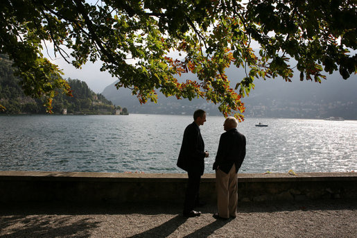Vice President Dick Cheney speaks with an advisor Saturday, Sept. 6, 2008, between meetings at the Ambrosetti Forum on the shoreline of Lago di Como in Cernobbio, Italy. Following his visit to Lago di Como, the Vice President will travel to Rome to meet with Italian officials on the final leg of an international trip to Europe and Central Asia. White House photo by David Bohrer