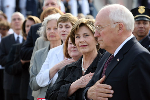 Mrs. Laura Bush stands with Vice President Dick Cheney during the National Anthem Thursday, Sept. 11, 2008, at the dedication ceremony for the 9/11 Pentagon Memorial at the Pentagon in Arlington, Va. White House photo by Joyce N. Boghosian
