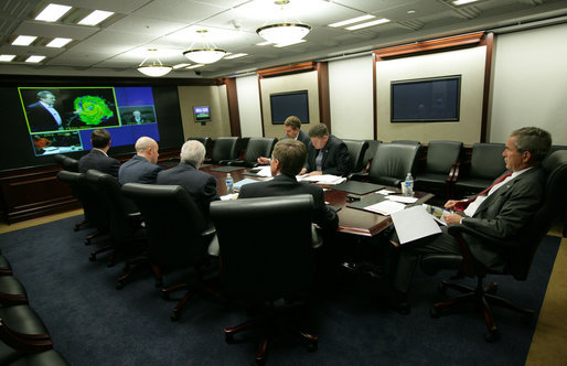 President George W. Bush participates in a video teleconference briefing on Hurricane Ike Saturday, Sept. 13, 2008, with officials from the National Hurricane Center, the Department of Homeland Security and FEMA. The briefing took place in the Situation Room of the White House. White House photo by Chris Greenberg