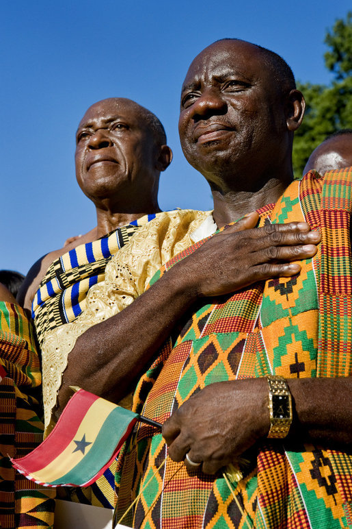 Guests in traditional Ghanaian dress stand for the playing of the national anthems Monday, Sept. 15, 2008, during the South Lawn Arrival Ceremony for President John Agyekum Kufuor of Ghana at the White House. White House photo by David Bohrer
