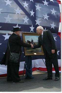 Re-enactment participant Jack Fishman presents Vice President Dick Cheney with an oil painting on September 19, 2008, depicting Cheney's great-grandfather Samuel Fletcher Cheney at the Battle of Chickamauga. Cheney's great-grandfather fought in the 1863 Civil War battle as Captain in the 21st Ohio Volunteer Infantry. White House photo by David Bohrer